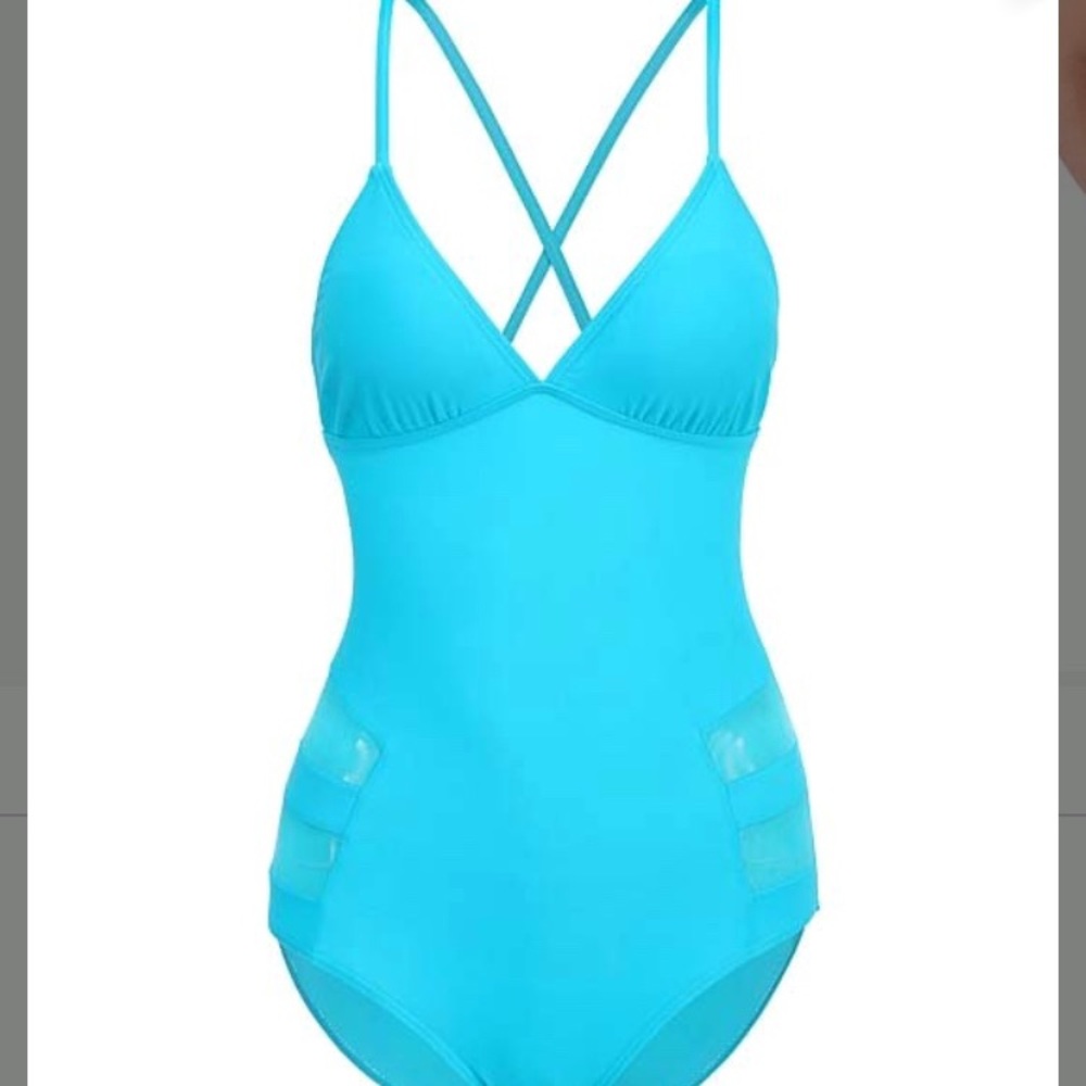 NWT turquoise crisscross Strap one piece